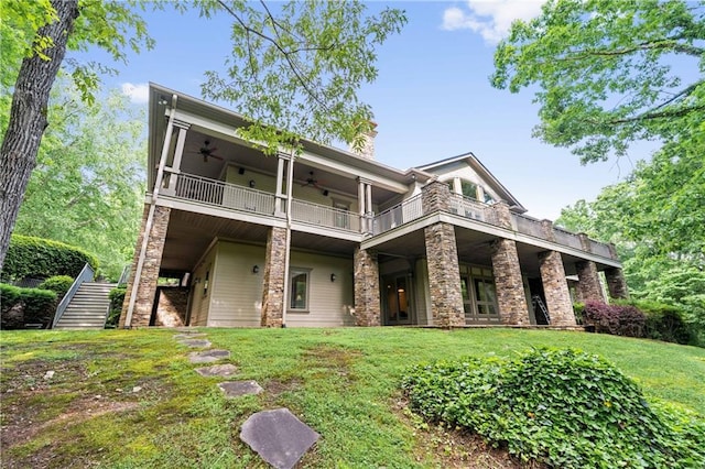 1447 Travis Smith Rd, Clarkesville, GA 30523 - back of property featuring ceiling fan, a balcony, a yard, and a chimney