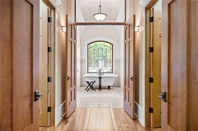 1447 Travis Smith Rd, Clarkesville, GA 30523 - hallway with light wood-style flooring and a wainscoted wall
