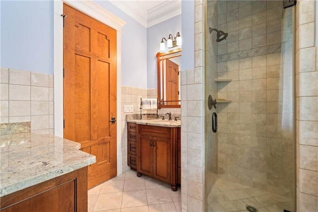 1447 Travis Smith Rd, Clarkesville, GA 30523 - bathroom featuring crown molding, a stall shower, tile walls, vanity, and tile patterned floors