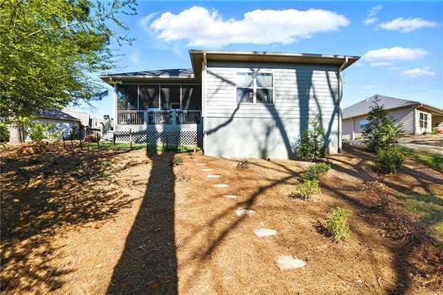 745 Skyview Dr, Commerce, GA 30529 - back of property featuring a sunroom