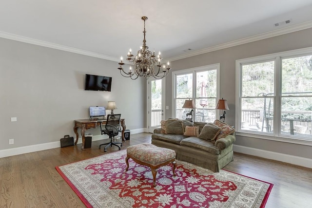 living room with wood finished floors, visible vents, crown molding, baseboards, and a chandelier