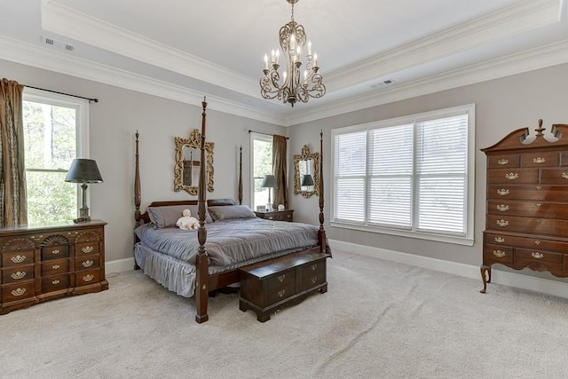 bedroom with multiple windows, visible vents, carpet flooring, and a notable chandelier