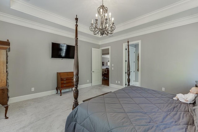 carpeted bedroom with baseboards, crown molding, a tray ceiling, and a chandelier