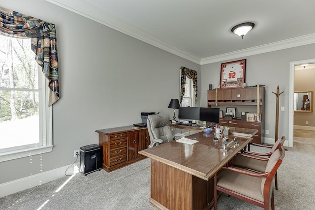 office area with light carpet, baseboards, and ornamental molding