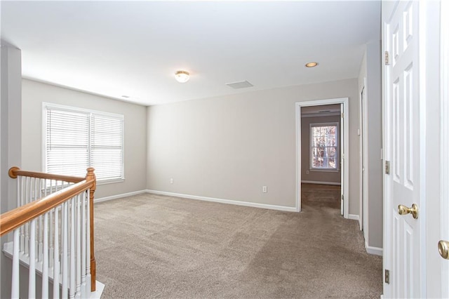 view of carpeted spare room