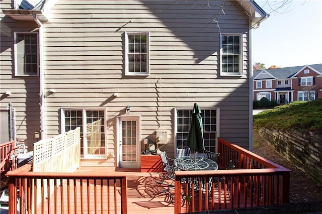 rear view of house with a deck