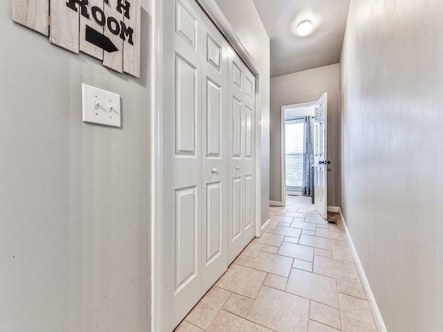 5090 Eubanks Rd, Woodstock, GA 30188 - hallway with baseboards and stone tile floors