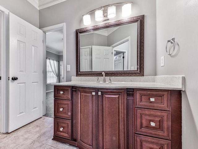 5090 Eubanks Rd, Woodstock, GA 30188 - bathroom featuring crown molding, vanity, and tile patterned flooring