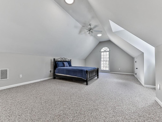 5090 Eubanks Rd, Woodstock, GA 30188 - bedroom featuring carpet floors, vaulted ceiling, baseboards, and ceiling fan