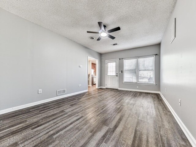 5090 Eubanks Rd, Woodstock, GA 30188 - unfurnished room featuring a ceiling fan, a textured ceiling, dark wood-style flooring, and baseboards