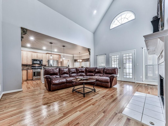 5090 Eubanks Rd, Woodstock, GA 30188 - living room with light wood-style flooring, high vaulted ceiling, recessed lighting, and baseboards