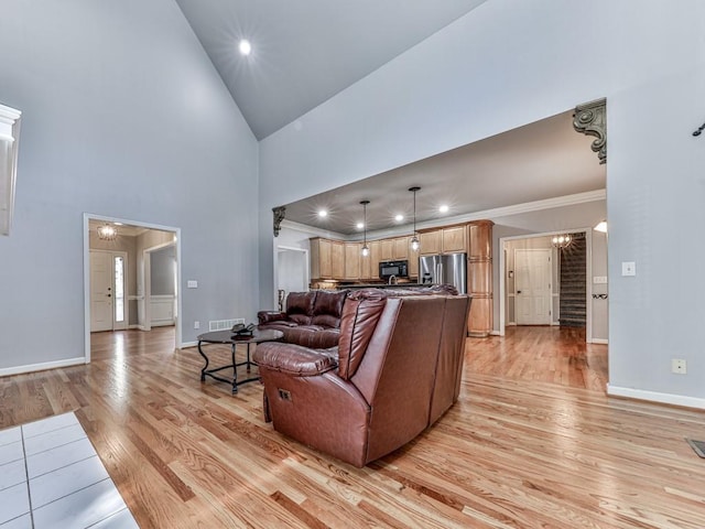 5090 Eubanks Rd, Woodstock, GA 30188 - living room with light wood-style flooring, baseboards, ornamental molding, recessed lighting, and high vaulted ceiling