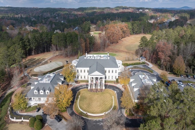 bird's eye view featuring a forest view