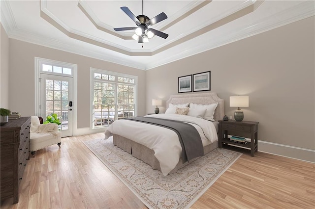 6191 Talmadge Run, Acworth, GA 30101 - bedroom featuring access to exterior, ornamental molding, a raised ceiling, and light wood finished floors