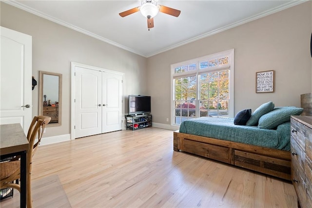 6191 Talmadge Run, Acworth, GA 30101 - bedroom featuring light wood-style floors, baseboards, ornamental molding, and a ceiling fan