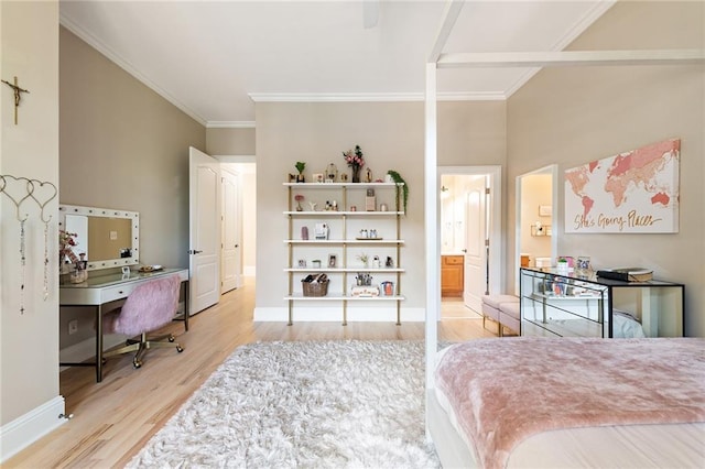 6191 Talmadge Run, Acworth, GA 30101 - bedroom featuring baseboards, ornamental molding, connected bathroom, and wood finished floors