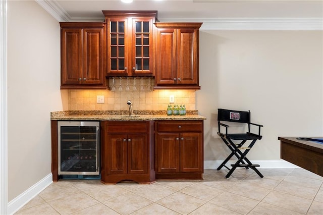 6191 Talmadge Run, Acworth, GA 30101 - bar featuring beverage cooler, wet bar, baseboards, decorative backsplash, and ornamental molding