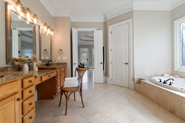 full bath with tile patterned floors, ornamental molding, a sink, double vanity, and tiled tub