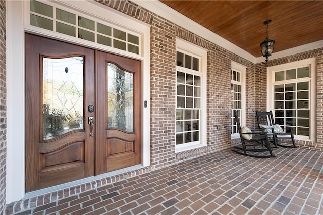 6191 Talmadge Run, Acworth, GA 30101 - doorway to property featuring french doors, covered porch, and brick siding