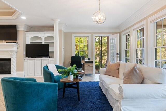 living room with a premium fireplace, a notable chandelier, light tile patterned flooring, and ornamental molding