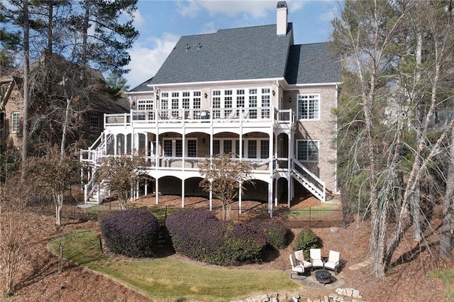 6191 Talmadge Run, Acworth, GA 30101 - back of property featuring stairs, a shingled roof, a wooden deck, a chimney, and a balcony