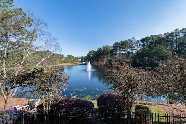 water view featuring fence