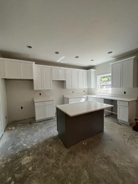 kitchen featuring a center island and white cabinets