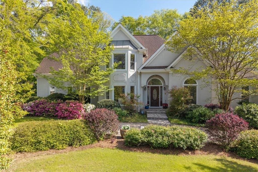 350 Covered Bridge Pl SW, Smyrna, GA 30082 - view of front of property featuring a front lawn and stucco siding