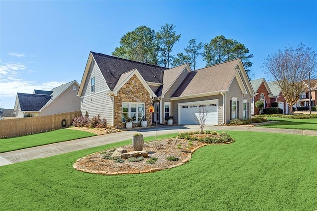 view of front of house featuring concrete driveway, a front yard, fence, a garage, and stone siding