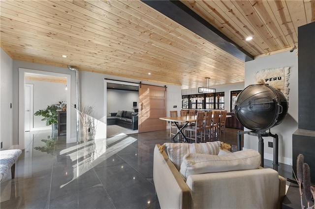 living room with wood ceiling and a barn door