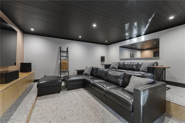 home theater featuring wood ceiling and light hardwood / wood-style floors