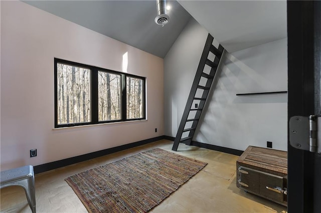 living room featuring lofted ceiling