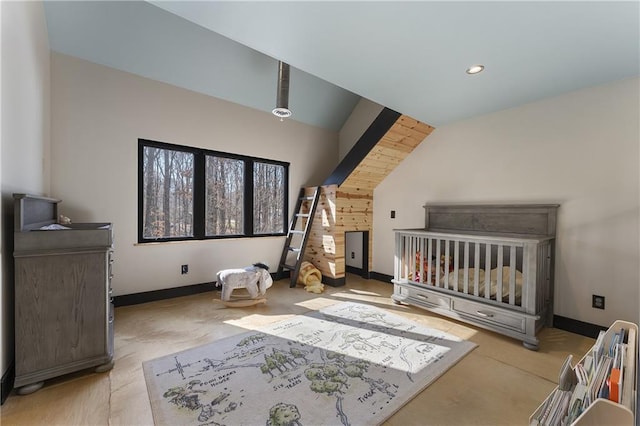 bedroom featuring lofted ceiling