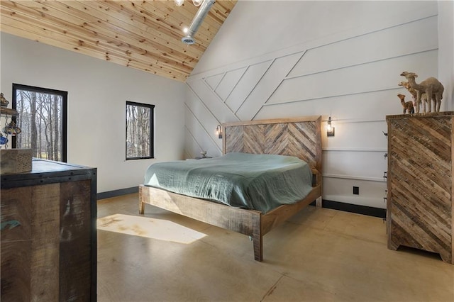 bedroom with high vaulted ceiling and wooden ceiling