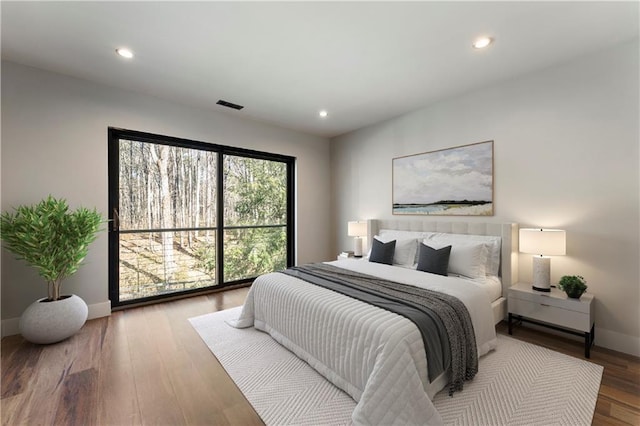 bedroom featuring hardwood / wood-style flooring