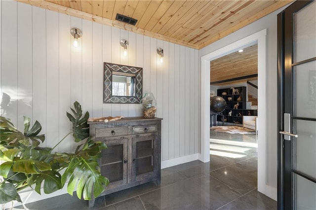 interior space featuring wood ceiling