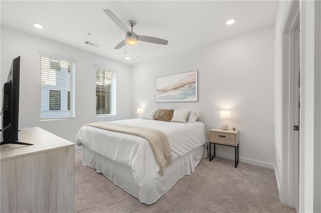 bedroom featuring visible vents, baseboards, ceiling fan, light carpet, and recessed lighting