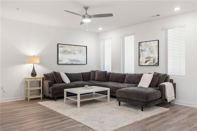 living room featuring recessed lighting, visible vents, light wood-style floors, and ceiling fan