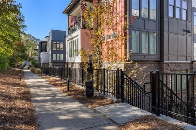 view of home's exterior featuring fence