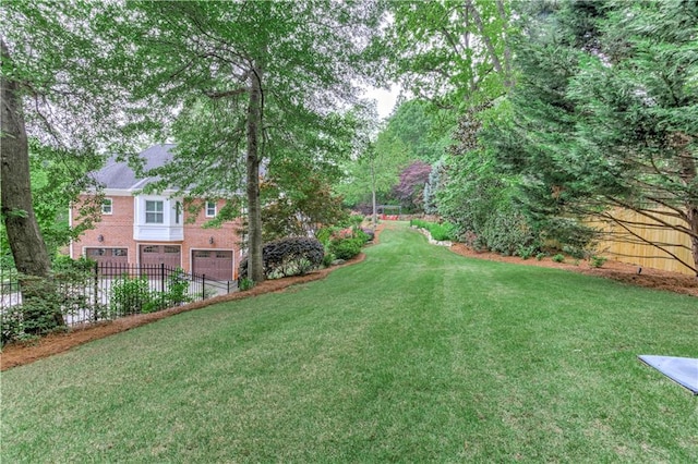 452 Brushstroke Ct SE, Marietta, GA 30067 - view of yard with a garage