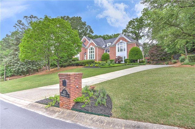 452 Brushstroke Ct SE, Marietta, GA 30067 - traditional-style house with a front lawn and brick siding