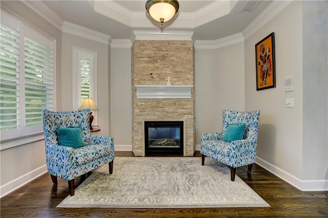 452 Brushstroke Ct SE, Marietta, GA 30067 - sitting room with wood finished floors, baseboards, crown molding, a fireplace, and a tray ceiling
