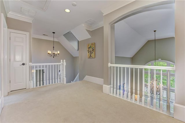 452 Brushstroke Ct SE, Marietta, GA 30067 - hall featuring a chandelier, carpet floors, crown molding, arched walkways, and recessed lighting