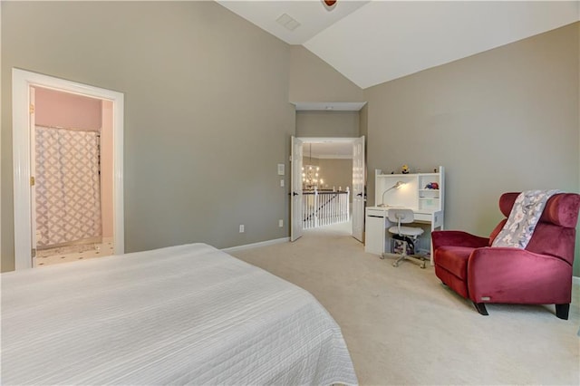 452 Brushstroke Ct SE, Marietta, GA 30067 - carpeted bedroom with high vaulted ceiling, connected bathroom, a chandelier, and baseboards