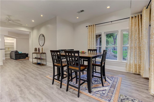 452 Brushstroke Ct SE, Marietta, GA 30067 - dining space featuring baseboards, wood finished floors, ceiling fan, and recessed lighting