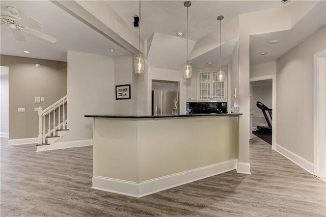 452 Brushstroke Ct SE, Marietta, GA 30067 - kitchen with stainless steel refrigerator with ice dispenser, white cabinets, glass insert cabinets, wood finished floors, and recessed lighting