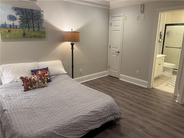 452 Brushstroke Ct SE, Marietta, GA 30067 - bedroom featuring ornamental molding, baseboards, wood finished floors, and ensuite bathroom