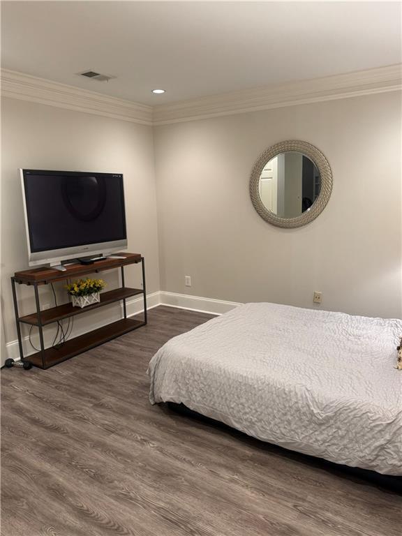 452 Brushstroke Ct SE, Marietta, GA 30067 - bedroom featuring ornamental molding, baseboards, wood finished floors, and recessed lighting
