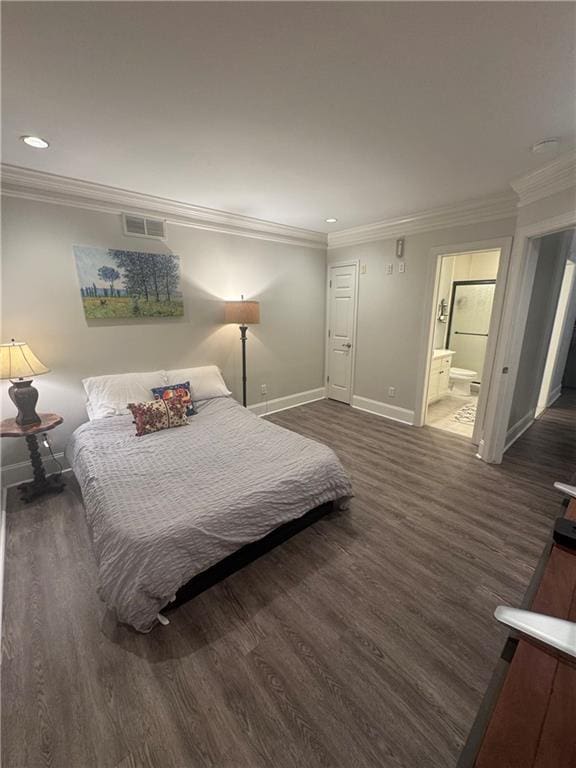 452 Brushstroke Ct SE, Marietta, GA 30067 - bedroom featuring ornamental molding, baseboards, recessed lighting, wood finished floors, and ensuite bathroom