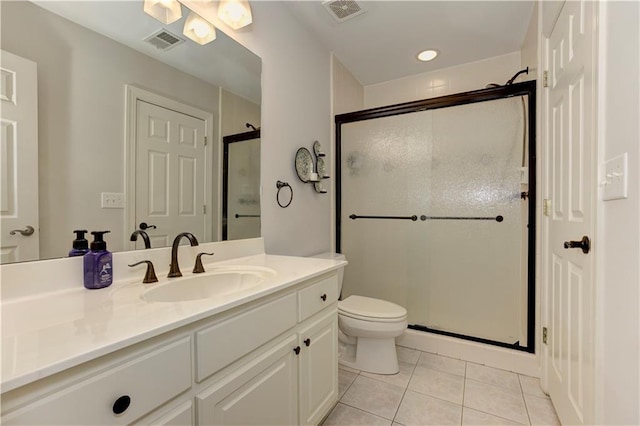 452 Brushstroke Ct SE, Marietta, GA 30067 - full bathroom featuring tile patterned flooring, vanity, a stall shower, and toilet